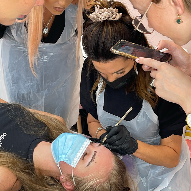 students learning microblading